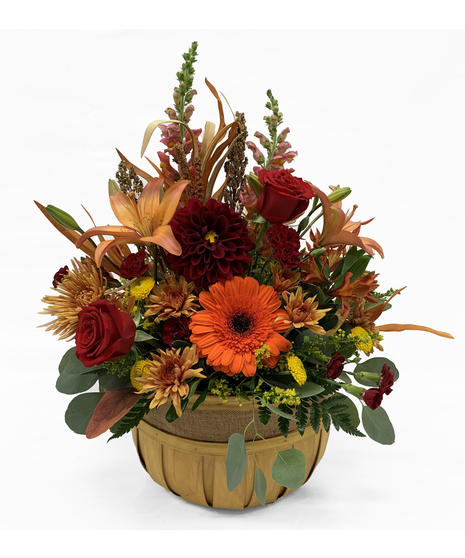 fall toned flowers in basket