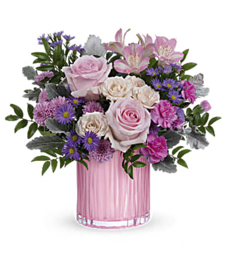 pink and lavender flowers in pearlescent vase