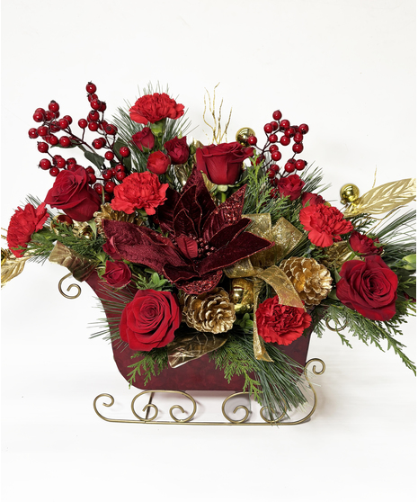 Santa Sleigh holiday floral arrangement