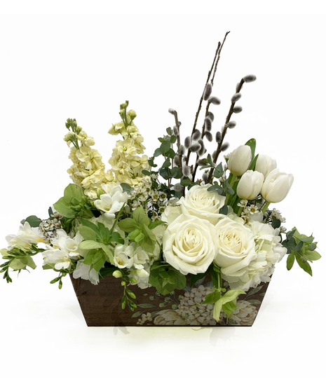 white flowers in wooden floral box